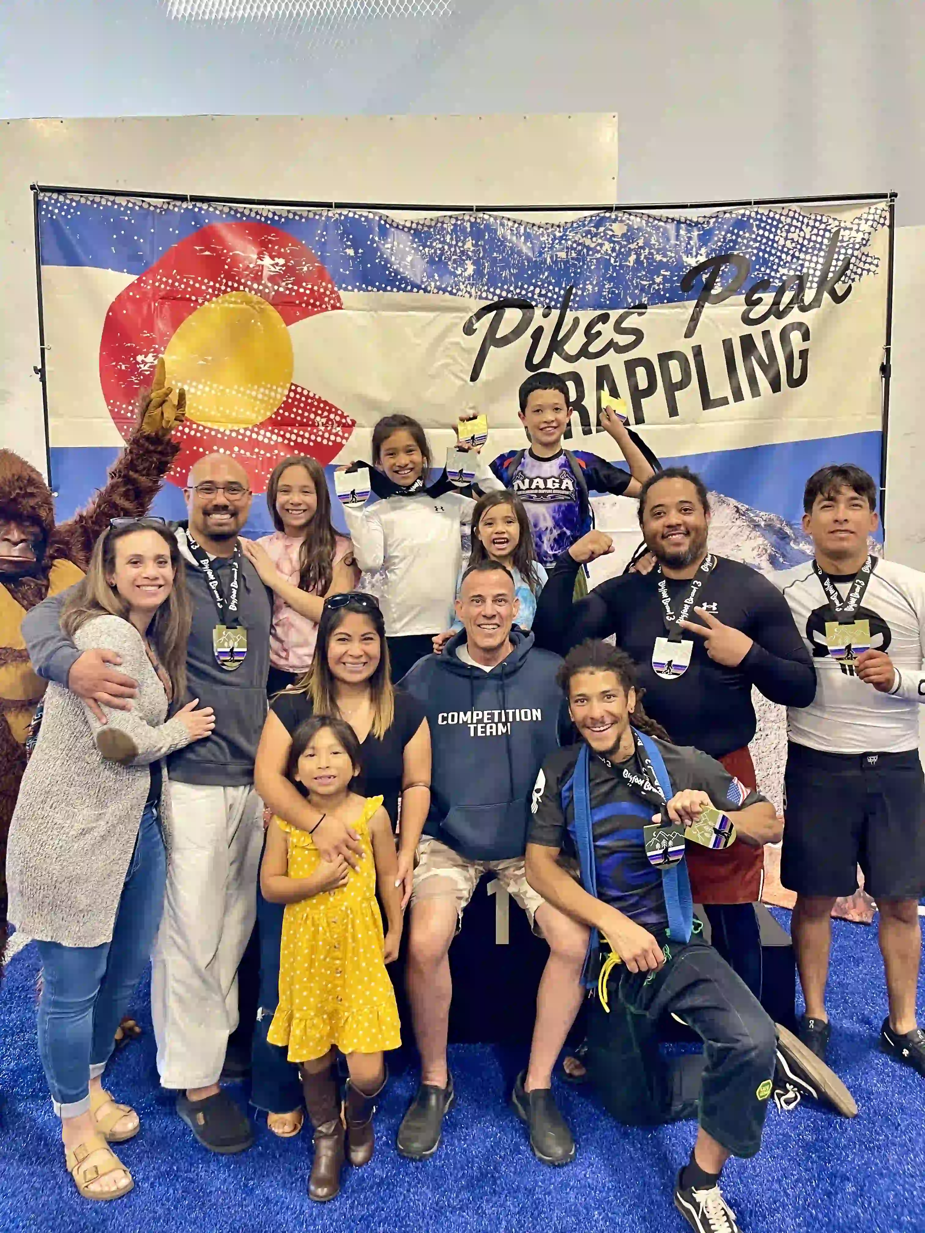 Kids learning Brazilian Jiu-Jitsu techniques